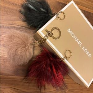 Michael Kors Black, Tan, and Red Pom Pom Keychains